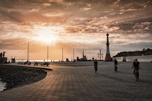 Willy-Brandt-Platz with lighthouse Unterfeuer at sunset