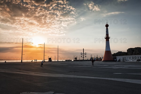 Willy-Brandt-Platz with lighthouse Unterfeuer at sunset