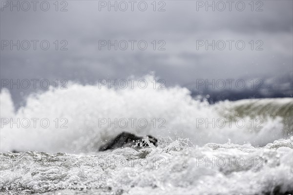 Storm Lolita raging on the stony shore in Hagnau