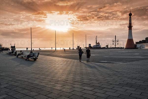 Willy-Brandt-Platz with lighthouse Unterfeuer at sunset