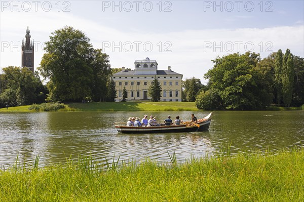 Woerlitz Castle and St. Petri Church on Lake Woerlitz