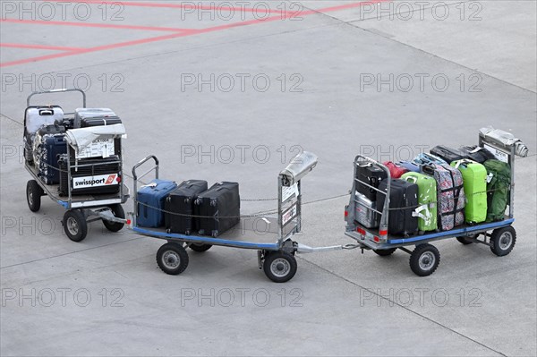 Baggage trolley with suitcase