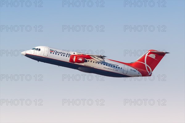 A British Aerospace Avro RJ100 aircraft of Qeshm Air with registration EP-FQU takes off from Dubai Airport