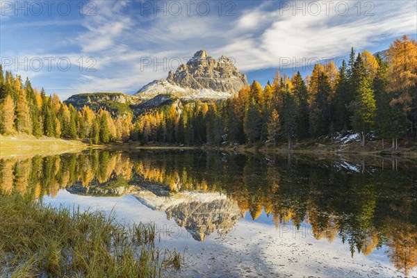 Antorno lake towards Tre Cime di Lavaredo mountain reflected in lake