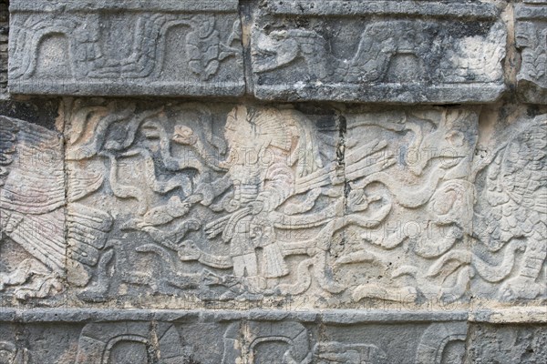 Sandstone relief in the excavation site of the Maya city of Chichen Itza