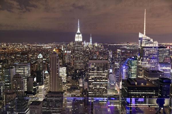 View of Midtown and Downtown Manhattan and Empire State Building from Top of the Rock Observation Center at sunset