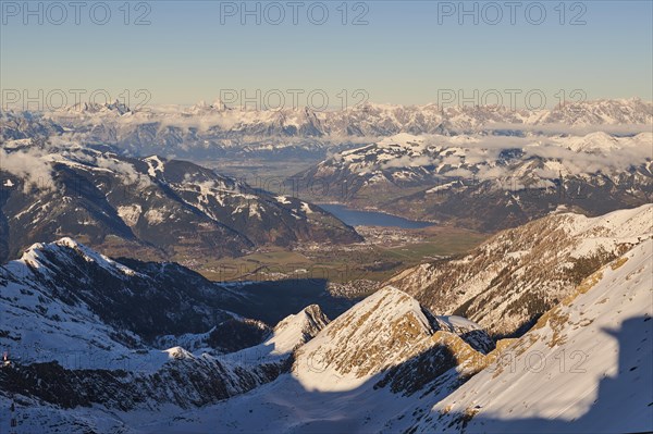View from Mount Kitzsteinhorn on snow covered mountains down to Zell am See