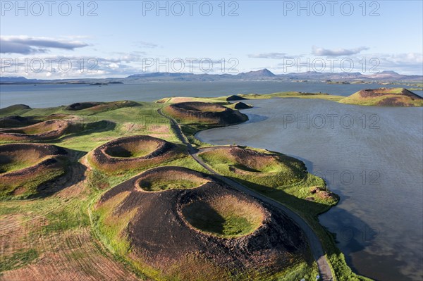 Aerial view of green volcanic crater