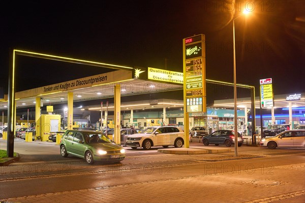 Cars refuelling at a petrol station