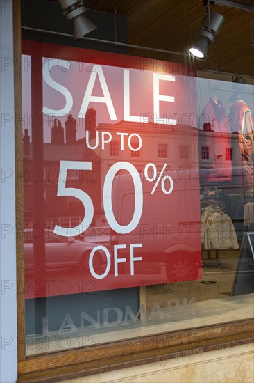 Sale 50% off Landmark shop window