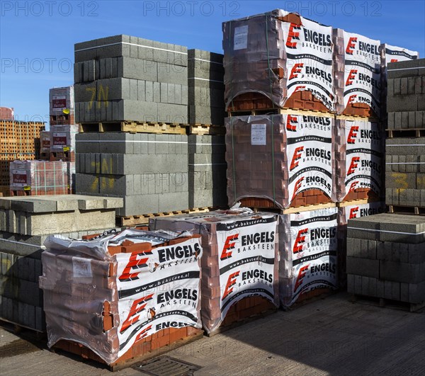 Piles of bricks in Jewson builders merchant yard