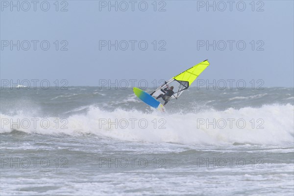 Breaking Wave with surfer