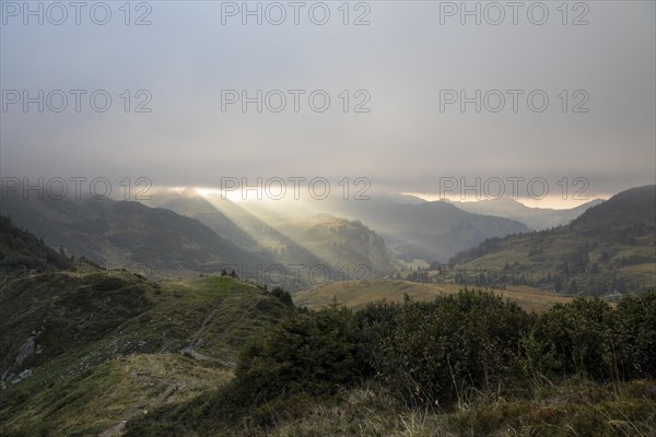 Fog in the high valley on an autumn evening at Potlakopf