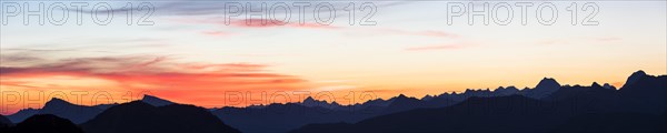 Mountain panorama in front of sunrise from Portlakopf