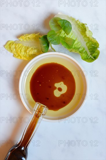 Bowl with cooking oil and aceto balsamico