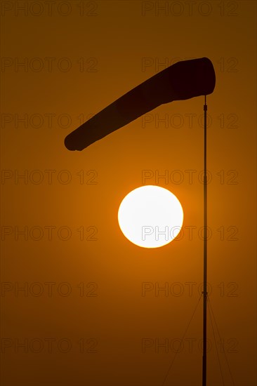Evening sun with windsock