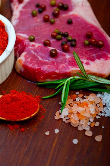 Raw uncooked ribeye beef steak butcher selection