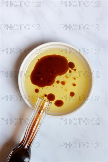 Bowl with cooking oil and aceto balsamico