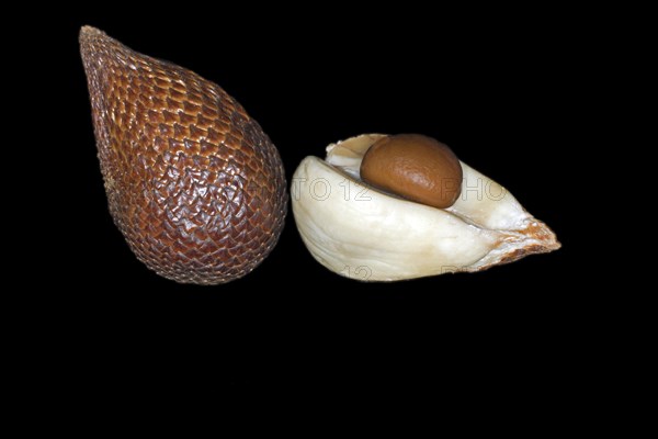 One whole and one halved and peeled salak