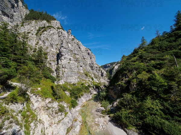 Rugged rocky mountain landscape in summer with a small river. Taken in the Oetschergraeben in Lower Austria