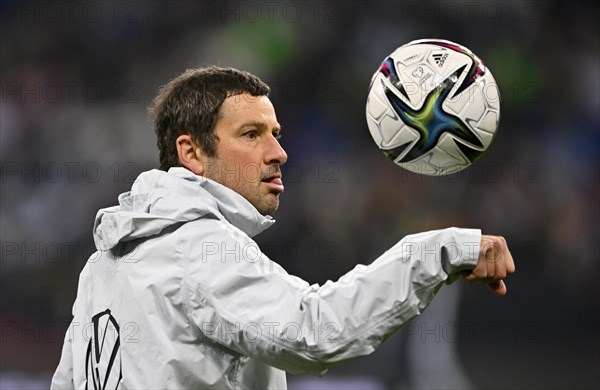 Co-coach goalkeeper coach Andreas Kronenberg GER juggles ball on arm