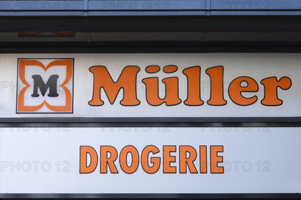 Sign and logo Mueller drugstore