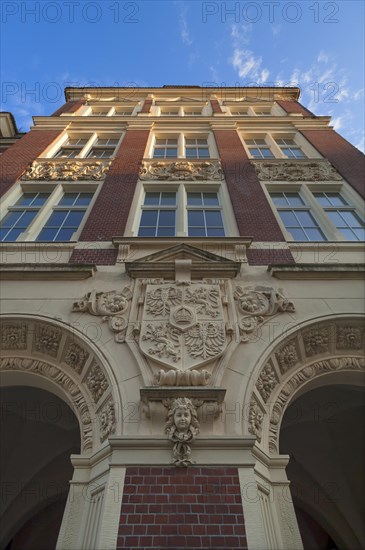 Main facade of the primary school with the old city coat of arms of Goerlitz