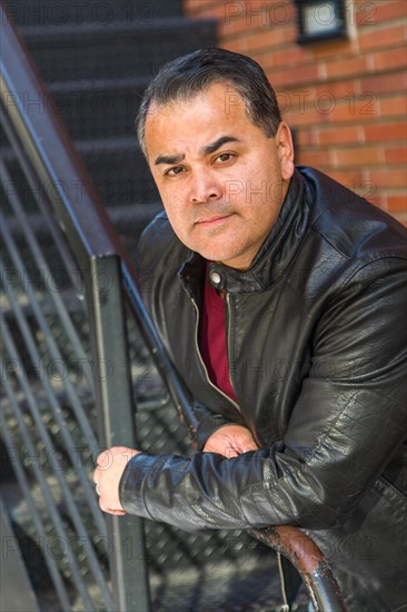 Headshot portrait of handsom hispanic man