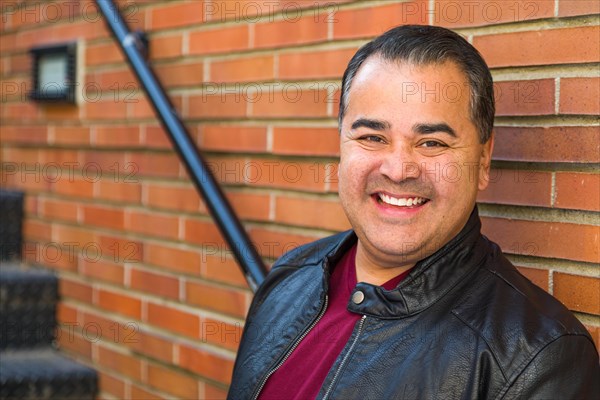 Headshot portrait of handsom hispanic man