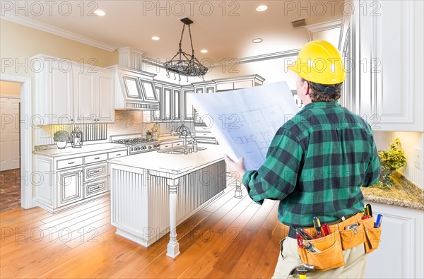Male contractor with hard hat and plans looking at custom kitchen drawing photo combination on white