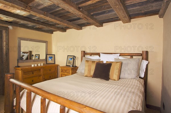 Luxurious rustic log cabin bedroom in a rural setting