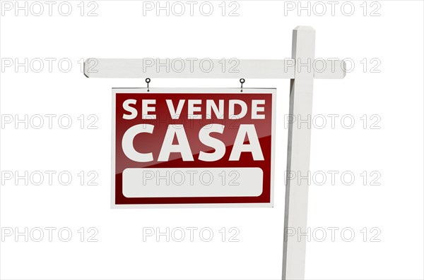 Spanish se vende casa real estate sign with clipping path isolated on a white background