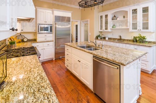 Beautiful custom kitchen interior with hard wood floors