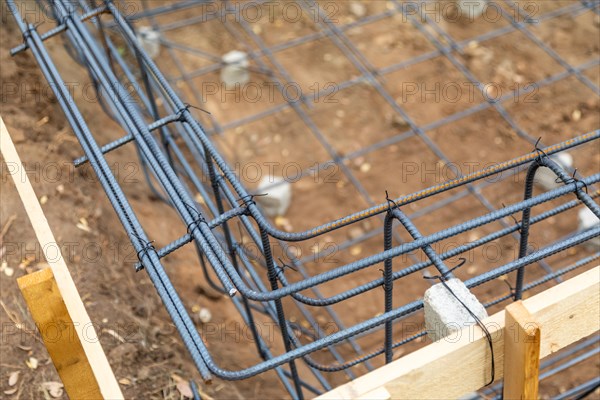 New steel rebar framing abstract at construction site