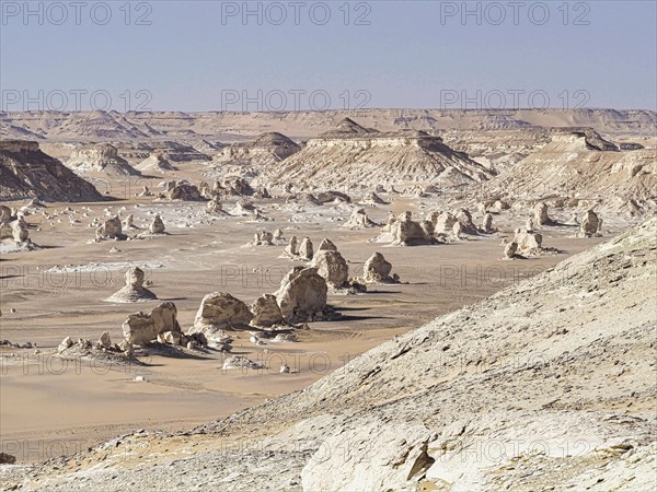 Wide valley with chalk sculptures in the Westside