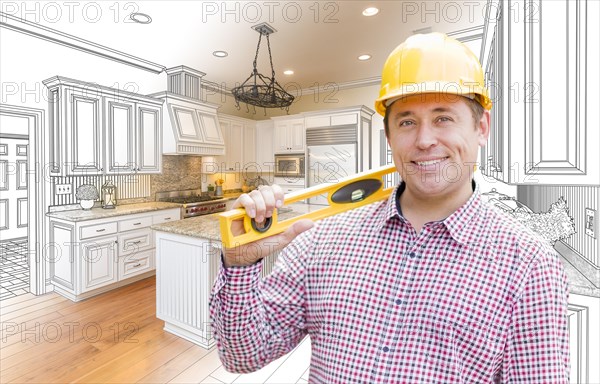 Smiling contractor in hard hat with level over custom kitchen drawing and photo combination