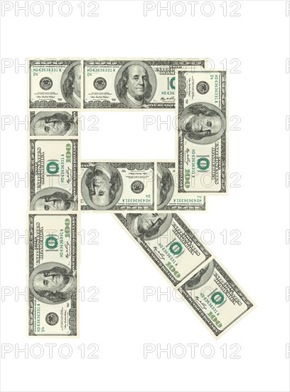 Letter R made of dollars isolated on white background