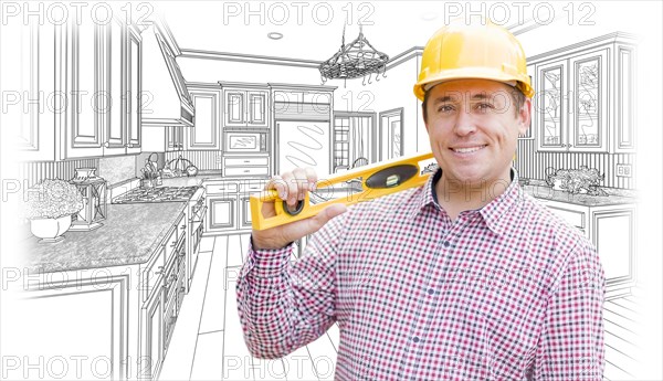 Smiling contractor in hard hat with level over custom kitchen drawing