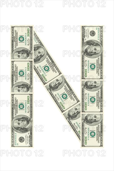 Letter N made of dollars isolated on white background