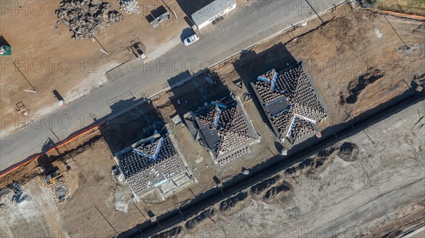 Drone aerial view of home construction site early stage