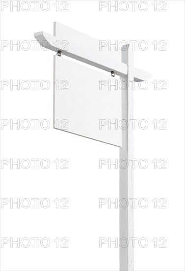 Blank real estate sign with upper placard ready for your own text