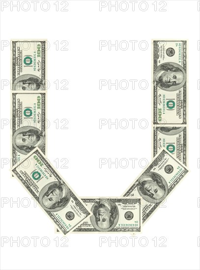 Letter U made of dollars isolated on white background