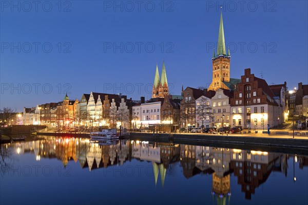 The historic old town on the Obertrave with the Church of St. Mary and the Church of St. Peter in the evening