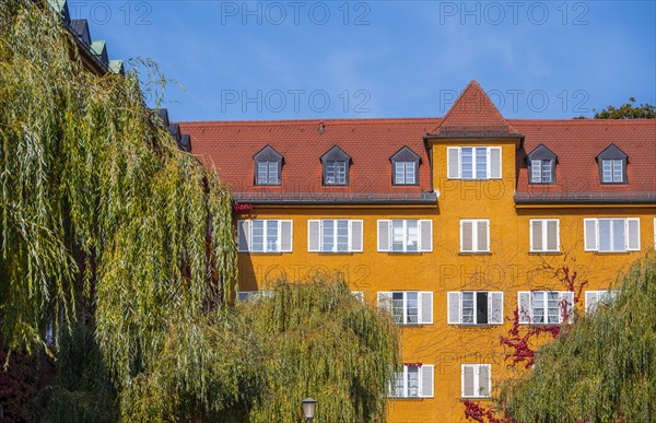 Inner courtyard with park and yellow apartment buildings