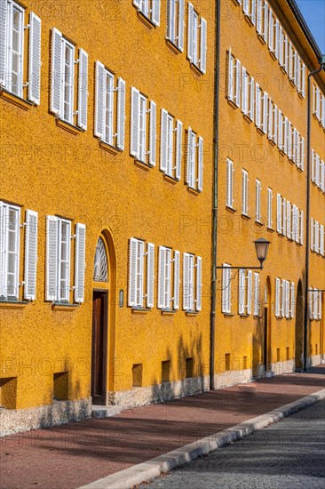 Inner courtyard with yellow apartment buildings