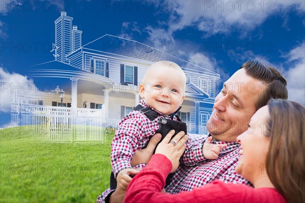 Happy young family with ghosted house drawing