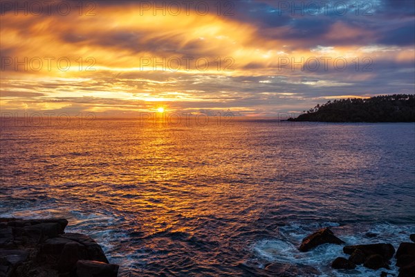 Ocean sunset with dramatic sky. Mirissa