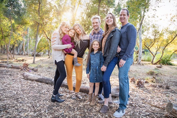 Multigenerational mixed-race family portrait outdoors
