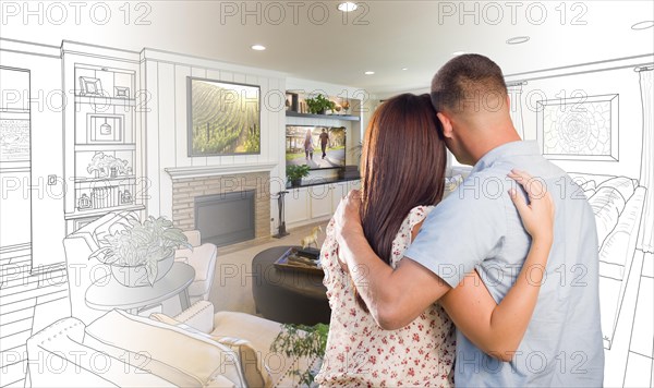 Curious young military couple looking over custom living room design drawing photo combination