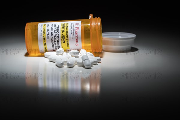 Hydrocodone pills and prescription bottle with non proprietary label. no model release required